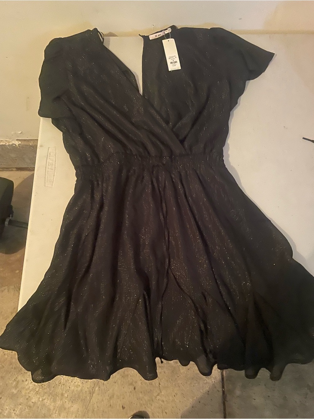 Francesca’s Women’s Black Shimmer Wrap Dress